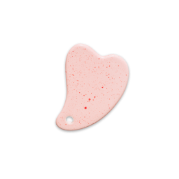 Różowy kamień gua sha